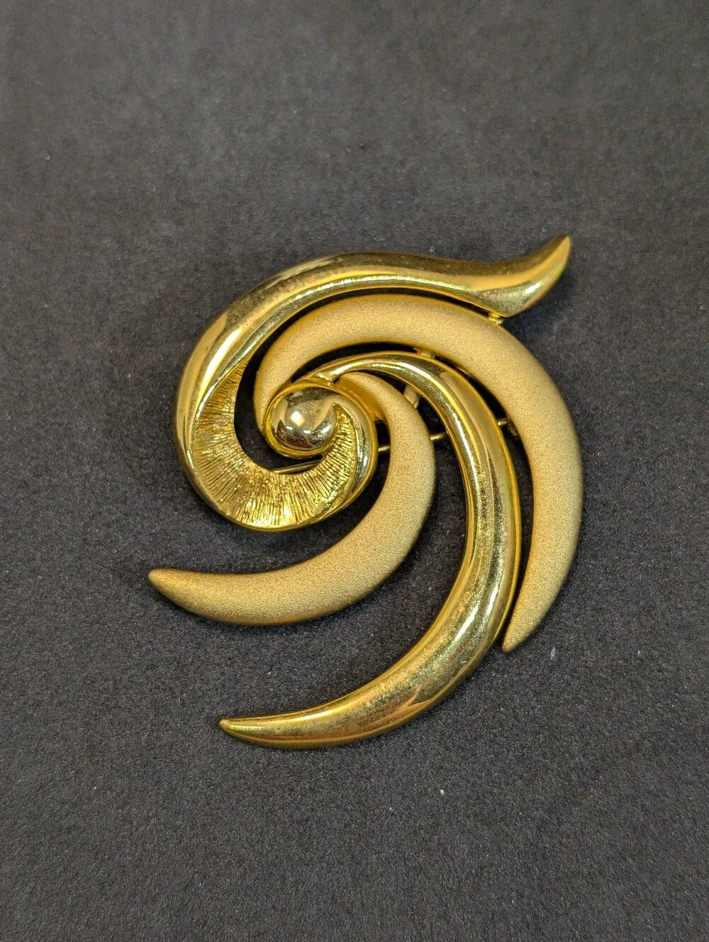 Gold Tone Swirl Brooch